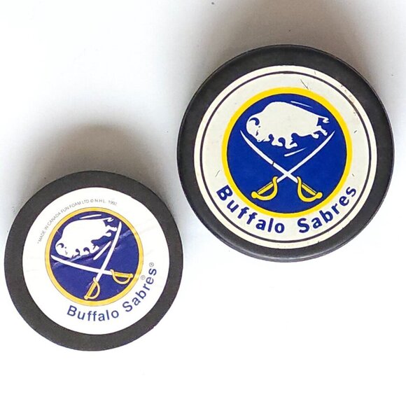 RETRO BUFFALO SABRES Hockey Pucks NHL One Standard Puck and one soft foam puck - Picture 1 of 4